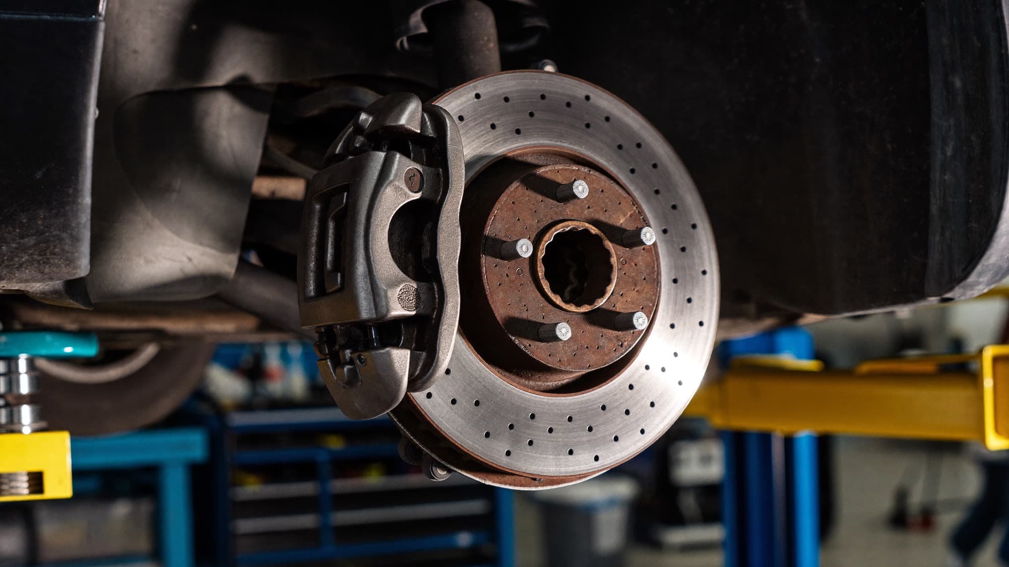 A brake rotor and caliper during a brake service